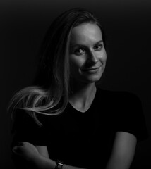 Poster - photo of beauty smiling woman on dark background in casual black cloths