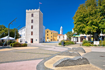 Town of Novi Vinodolski tower and old stone square view