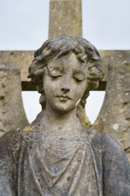 Face Of A Weeping Angel Statue Looking Downwards