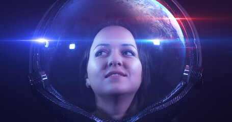 Wall Mural - portrait shot of the young smiling female astronaut in space helmet. she is exploring outer space in
