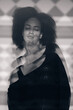 © Brkati Krokodil/Stocksy - Black And White Portrait Of A Young African Woman Through the Glass