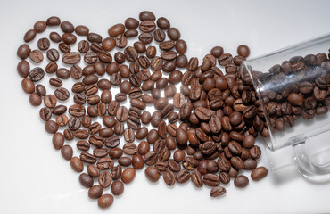 Wall Mural - heart shaped coffee beans on white