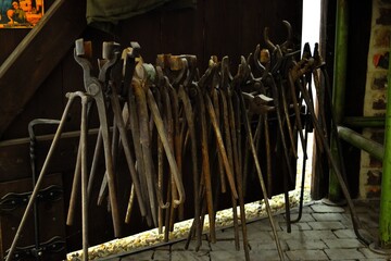 a set of pliers of a blacksmith's master with great variety for the processing of hot metal