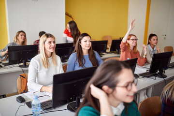 Wall Mural - Girls in classroom on lecture