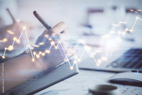 Cuadros en Lienzo Double exposure of forex graph drawing over people taking notes background