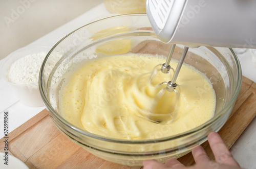 mixing dough for baking, flour, eggs, sugar, for cake or pastry