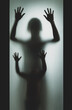 Concept shadow of mother and child behind the matte glass blurry hand and body soft focus.