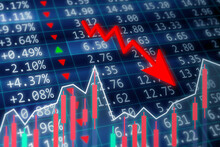 Stock market crash concept. A stock market crash is a sudden dramatic decline of stock prices across a major cross-section of a stock market. Financial data on a monitor with green arrow going up and 