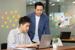 © sopradit - Asian business maen meeting and talk about job  on labtop in office.