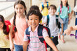 © Tom Wang - happy Group of elementary school kids running forward