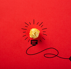 Creative idea, Inspiration, New idea and Innovation concept with Crumpled Paper light bulb