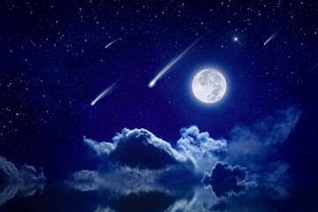 Wall Mural - starry night sky with full moon rising above serene sea, shooting stars or comets in dark sky.