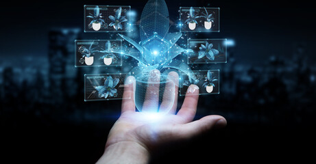 Fototapete - Man hand holding and touching holographic projection of a plant with digital analysis 3D rendering