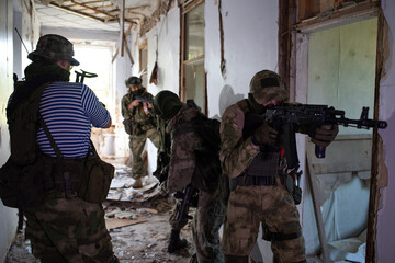 A team of professional airsoft players clear the location from opponents