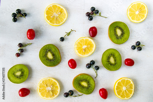 Currant, Cornus and dogberry, lemon and kiwi high angle view Tableau sur Toile