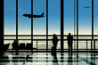 © TellingPhoto - Silhouette in the Airport Terminal Lounge Viewing Planes