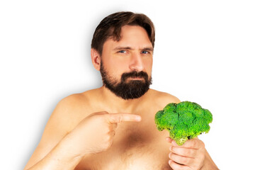 The man is holding broccoli in his hand.