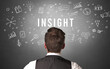 © ra2 studio - Rear view of a businessman with INSIGHT inscription, modern business concept