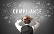 © ra2 studio - Rear view of a businessman with COMPLIANCE inscription, modern business concept