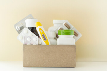 Image of a box of compounded prescription medications shipped from a mail order pharmacy on a lihgt background.