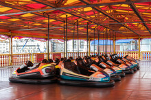 Bumper Cars Or Dodgems Lined Up In An Amusement Park Or Fairground