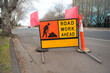 © Olha - Road sign Road work ahead. Australia, Melbourne. Warning sign.