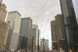 Fototapeta  - Skyline of buildings at Chicago river shore, Chicago, Illinois, United States