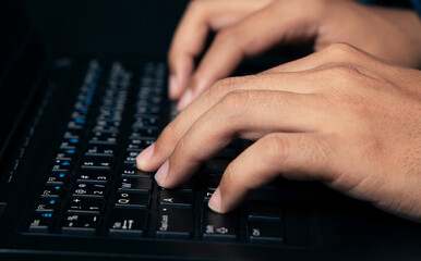 Business man pressing a button on his computer business and technology concept.