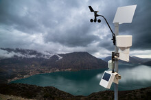 Meteorological Station For Measuring Weather In The Background Of The Dramatic Sky