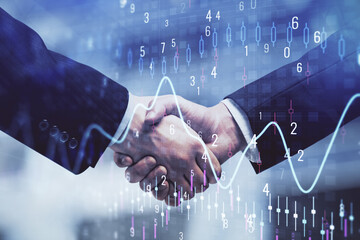 Double exposure of forex graph hologram and handshake of two men. Stock market concept.