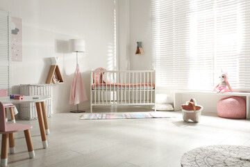 Poster - Cute baby room interior with crib and decor elements