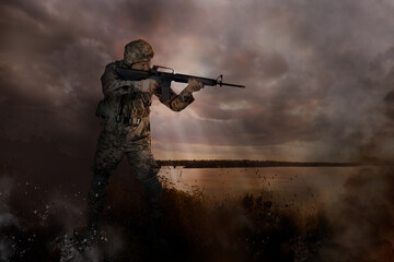 Wall Mural - Soldier with weapon on battlefield. Military service