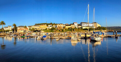 Wall Mural - Panoramic view of the picturesque town and harbor of Ortigueira, in the Galicia region of Spain.