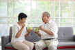 © tonefotografia - An elderly couple are eating healthy food , grandparents health care concept .