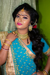 an indian girl with reception party makeup