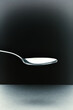 empty tablespoon on a black background