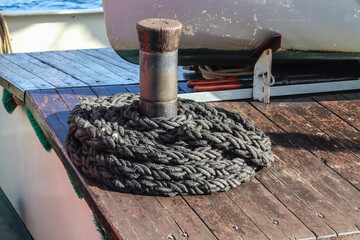 Wall Mural - Detailed close up detail of ropes and cordage in the rigging of an old wooden vintage sailboat