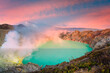 Panorama landscape view of Kawah Ijen at sunrise sky. The most famous tourist attraction in Indonesia.