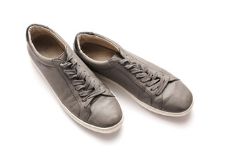 Pair of casual male shoes on white background