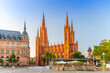 Wiesbaden cityscape with Evangelical Market Protestant church or Marktkirche and City Palace Stadtschloss or New Town Hall Rathaus on Market Square in historical city centre, State of Hesse, Germany