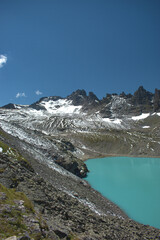 Wall Mural - Wunderschöner Bergsee auf dem Pizol in der Schweiz 7.8.2020