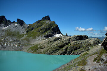 Wall Mural - Wunderschöner Bergsee auf dem Pizol in der Schweiz 7.8.2020