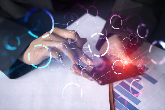 Businesswoman using smart phone in office. Abstract drawing hologram. Double exposure.