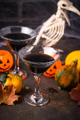 Wall Mural - Halloweens spooky drink black martini cocktail