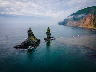 View from above. Kekura sea rock Two brothers in the village of Rudnaya Pristan. Landmark of the north of the Primorsky Territory, depicted on a banknote of 1 thousand rubles, sample of 1997