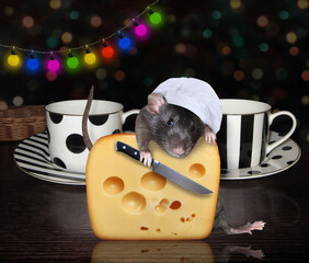 A black rat cook in a chef hat with a knife is cutting a big piece of cheese with holes near tea cups on a table.