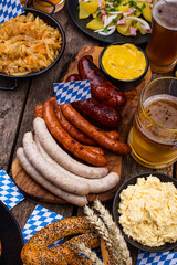 Wall Mural - Oktoberfest dishes with beer, pretzel and sausage