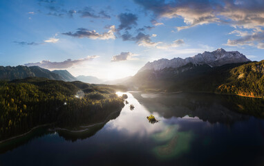 Wall Mural - Aerial panorama of Eibsee mountain lake with small islands in the morning sun