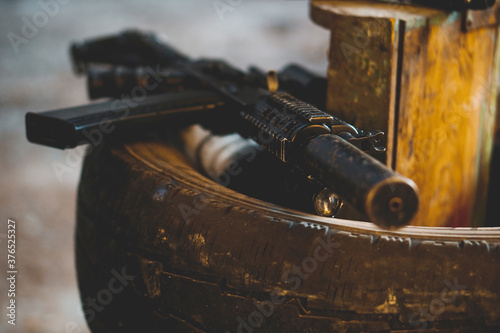 Fotomural Close up of airsoft rifle. Selective focus.