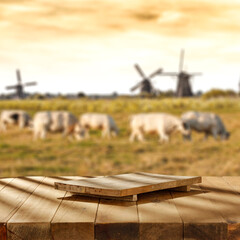 Wall Mural - Desk of free space and blurred landscape of farm 